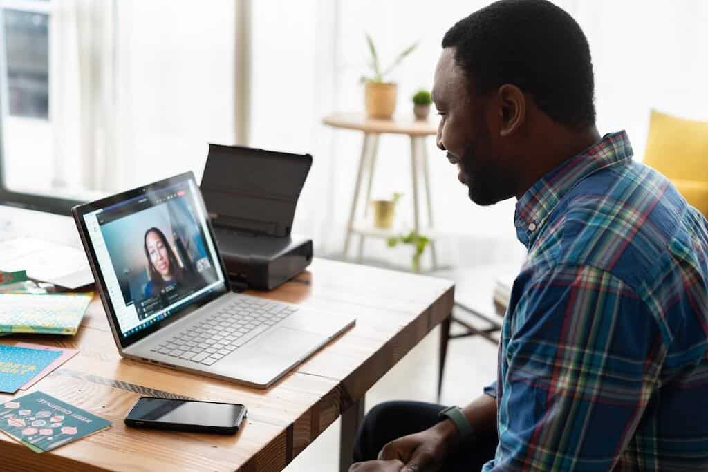 Researcher interviewing a participant on a video call